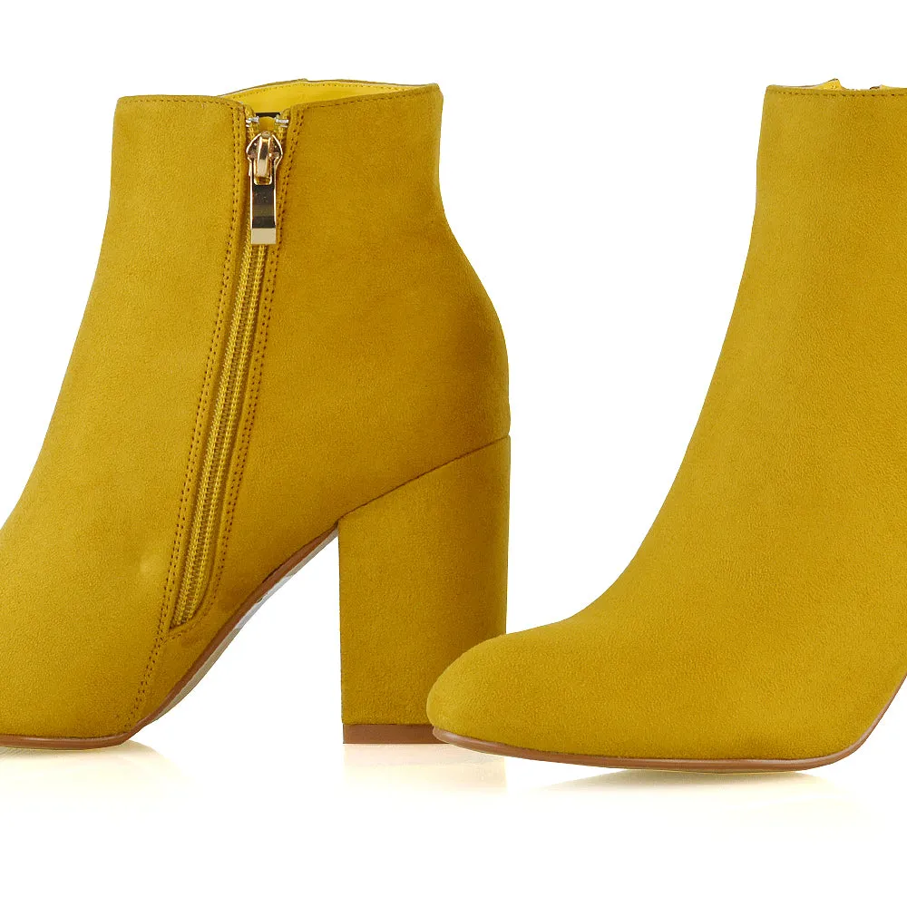 PEACHES CHUNKY BLOCK HIGH HEEL ZIP UP ANKLE WINTER BOOTS IN MUSTARD